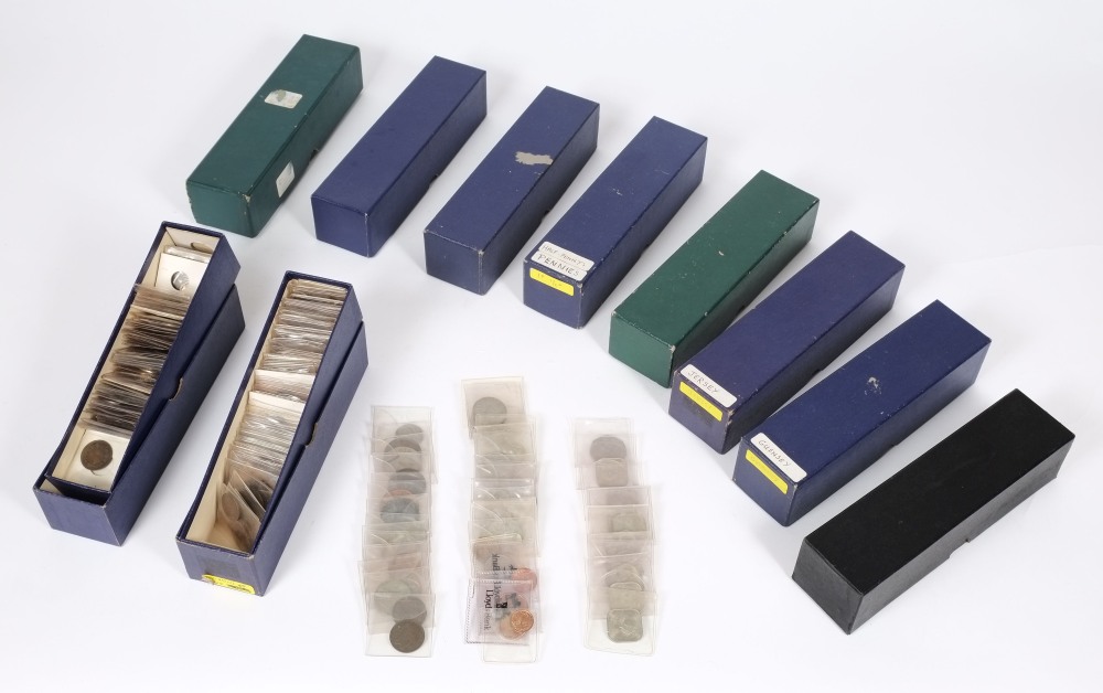 A collection of British and foreign coinage: contained in eleven collectors boxes.