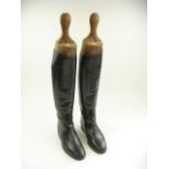 A pair of Tom Hill black leather riding boots with shoe trees, circa 1940:.