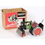 A Mamod live steam roller: with green and red coachwork, boxed.