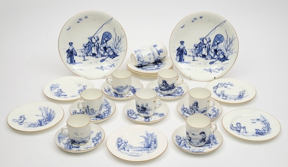 A late 19th century Staffordshire blue and white child's tea service with decoration of children at