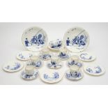 A late 19th century Staffordshire blue and white child's tea service with decoration of children at