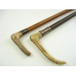 A silver mounted antler handled riding crop by Swaine & Adney,