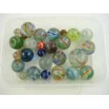 A small collection of marbles including cane twist and birdcage examples:..