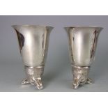 A pair of Italian plated stirrup cups,: the bases in the form of foxes masks, 13.5cm. high.