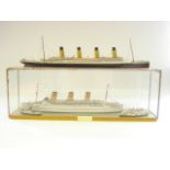 A waterline scale model of the Empress of Great Britain amongst other shipping,