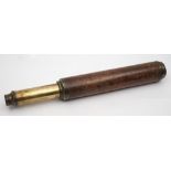 A mahogany bound three draw Day or Night telescope by Harris and Son, London:,