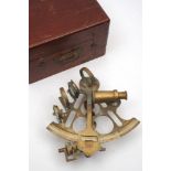 An ornamental brass 8 inch vernier sextant stamped 'Elliot Bros, London':,