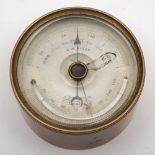 A 3 inch brass cased presentation aneroid barometer/thermometer by CW Dixey, London:,