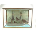 A cased model of a two masted transitional sail/steam schooner 'The Gypsy Queen' originally berthed