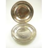 A pair of circular silver plated serving dishes for the French shipping company Chargeurs Reunis by