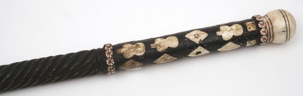 A late 19th century marine ivory inlaid and ebonised walking cane:,