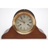 An American brass cased Ship's Watch clock by by Waterbury Clock Co, USA:,