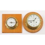 A brass cased 'Royal Mariner' bulkhead clock by Schatz,