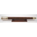 A leather cased single draw presentation telescope by Troughton & Sims, London:,