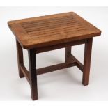 A teak luggage stand constructed from salvaged timber from HMS Britannia:,