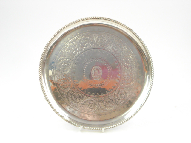 A circular silver plated salver for The West Indian and Pacific SS Company by Elkington:,