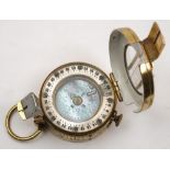 A brass Mills Mk 1 pocket compass:, with abalone dial in case, marked as per title to reverse.