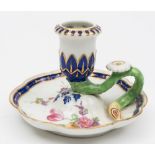 A Chelsea Derby porcelain chamberstick: with octofoil base and circular sconce moulded with stiff