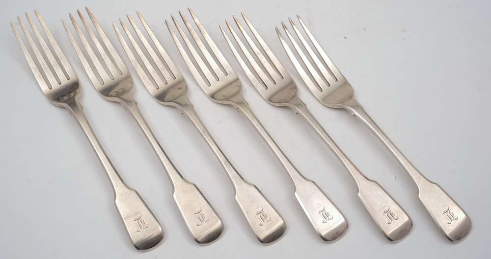 A set of six William IV provincial silver fiddle pattern table forks, maker William Woodman, Exeter,