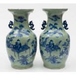 A pair of Chinese celadon ground baluster vases: with dragon handles,