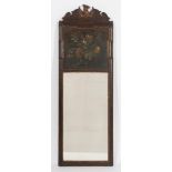 A walnut, partly gilt and decorated pier mirror in the early 18th Century taste:,