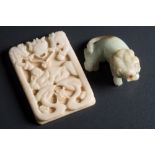 A Chinese white hardstone rectangular plaque and a similar carving of a recumbent lion: the plaque