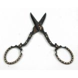 A pair of 19th century Tulaware scissors: 9cm. long.