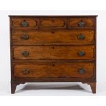 An early 19th Century mahogany and ebony strung rectangular chest:, the top with a reeded edge,