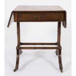 A Regency mahogany sofa table:, of small size, the hinged top with rounded corners,