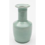 A Chinese celadon glazed vase: of mallet shaped form with flared rim, 17 cm high.