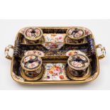 A unusual Davenport porcelain desk set: in the form of a two-handled tray with four covered