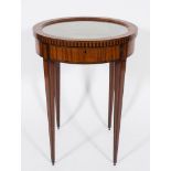 A late 19th Century Continental satinwood and inlaid circular bijouterie display table:,