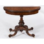 A Victorian carved and burr figured walnut half round card table:,