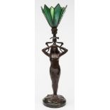 An Art Nouveau influence bronzed metal table lamp: the semi naked female partially draped and