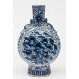 A large Chinese porcelain moon flask: of flattened form with Chilong handles,