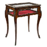 A 19th Century French kingwood and gilt metal mounted bijouterie display table:,