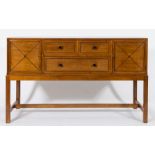 By Heal & Son Ltd - A mahogany and ebony strung rectangular sideboard:,