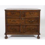 An early 18th Century oak, elm and ash rectangular chest:, of small size,