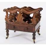 An early 19th Century carved rosewood three division canterbury:,