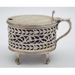 A Victorian silver mustard pot, maker James Deakin & Son, Sheffield, 1888: of oval outline,