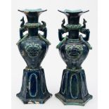 A pair of Chinese fahua vases: decorated in turquoise on a cobalt blue ground,