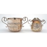 A Victorian silver porringer-style sugar basin and matching cream jug, maker Thomas Smiley, London,