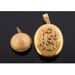 An 18ct gold oval locket: with applied rusticated monogram and a circular locket,