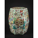 A Cantonese porcelain garden seat: of typical swelling hexagonal form applied with bands of bosses,