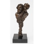 A 20th century bronze: depicting a male and female bust raised on an abstract stem,