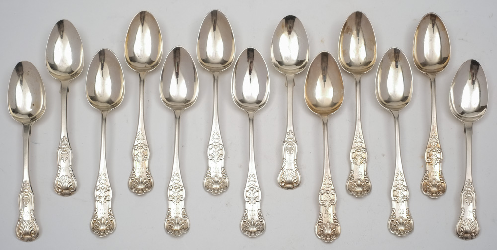 A set of nine Scottish silver Queens pattern teaspoons, maker JM.