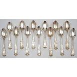 A set of nine Scottish silver Queens pattern teaspoons, maker JM.