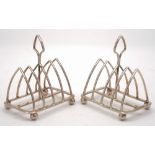 A pair of George V silver four-bar toast racks, maker David & George Edward, Sheffield,
