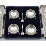 A set of four Edward VII silver salts, maker Brook & Sons, Edinburgh, 1908: of plain circular form,