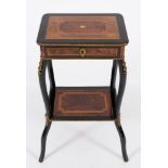 A 19th Century French ebonised, amboyna, inlaid and gilt metal mounted rectangular table:,